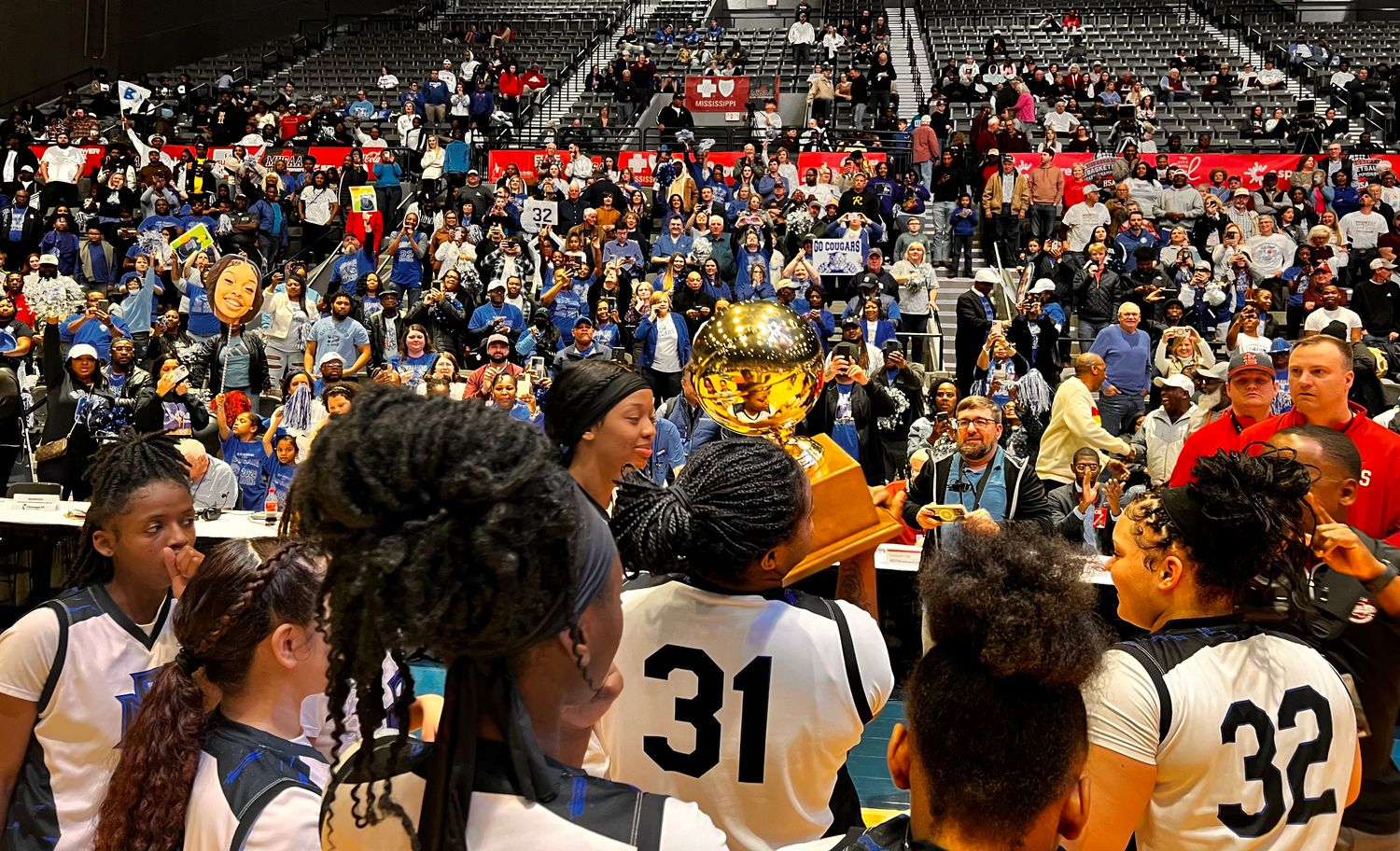 The Blue Mountain Lady Cougars celebrate their 2024 MHSAA Class 1A Championship on Feb. 29, 2024 at the Mississippi Coliseum in Jackson, Miss.